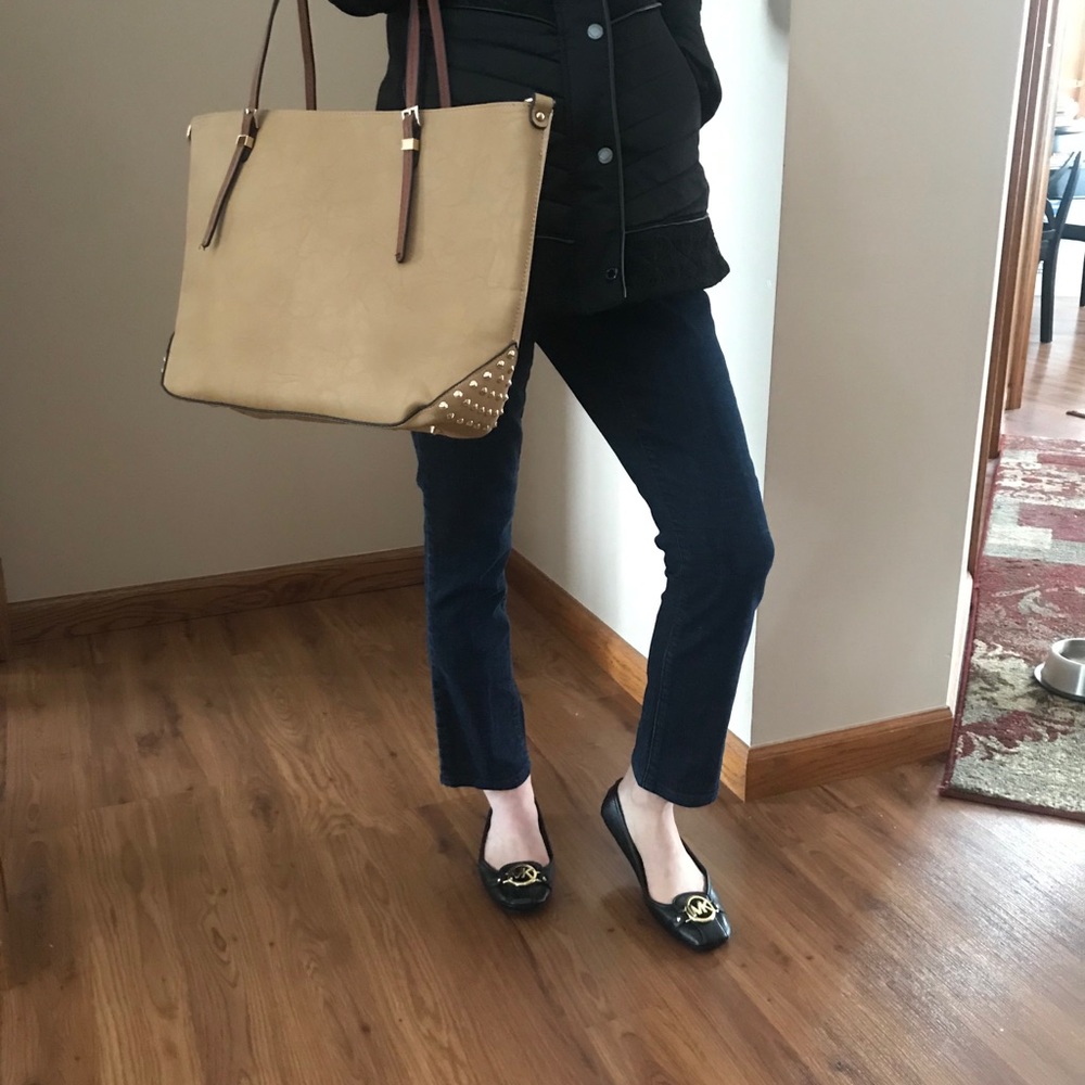 Tan studded handbag with leopard print lining